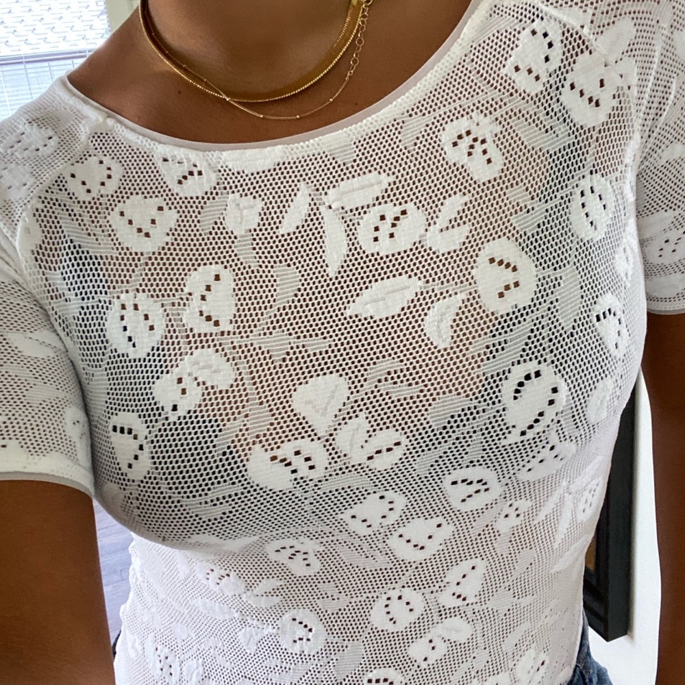 WOLFORD short sleeve lace bodysuit.